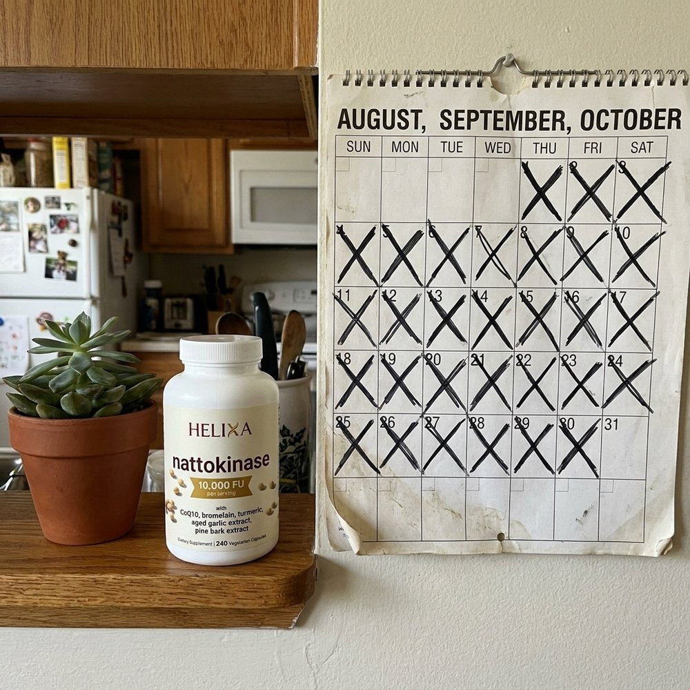 Helixa bottle next to the calendar — one order covers months